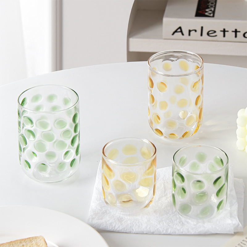 Polka dot painted glass cup