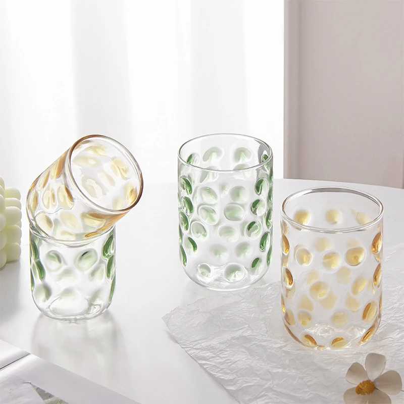 Polka dot painted glass cup