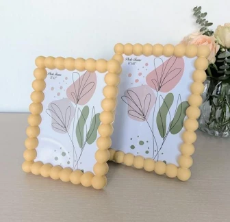 Plastic round beaded photo frame