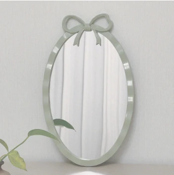 Plastic bow-shaped oval half-body mirror