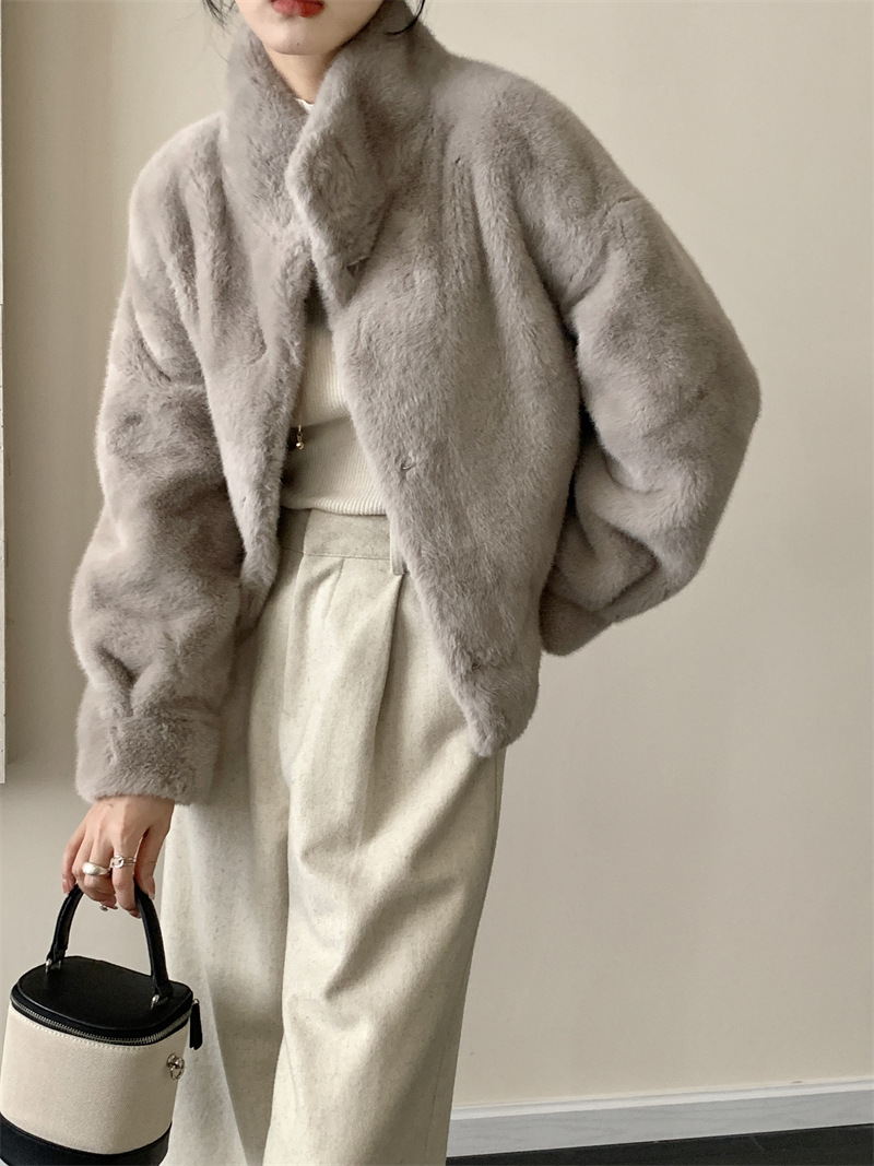 Environmentally friendly mink fur coat with integrated windproof collar and faux mink fur trim. Snowland mink coat for warmth in winter.