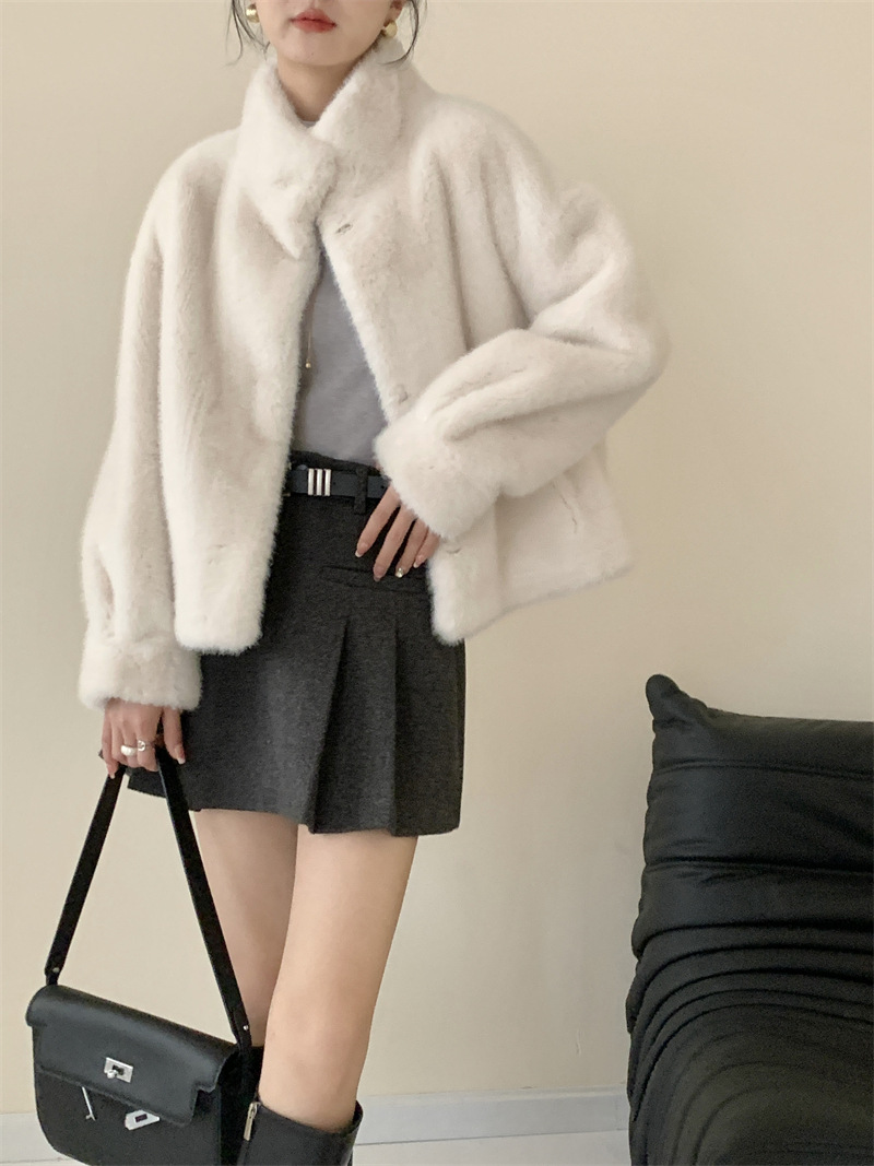 Environmentally friendly mink fur coat with integrated windproof collar and faux mink fur trim. Snowland mink coat for warmth in winter.