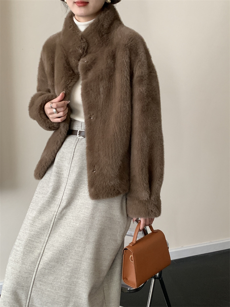 Environmentally friendly mink fur coat with integrated windproof collar and faux mink fur trim. Snowland mink coat for warmth in winter.