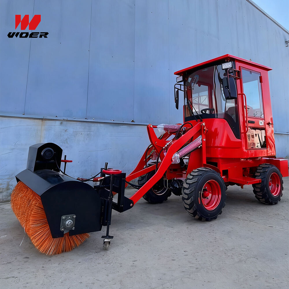 带封闭式驾驶室和吹雪机的电池供电小型装载机 | 适用于冬季作业的小型电动装载机