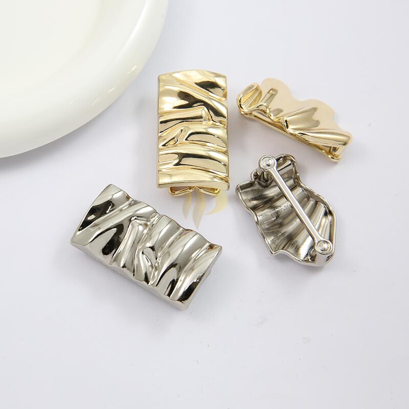 Metal buckle for ruched swimwear