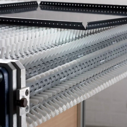 Conveyor belt type brushes