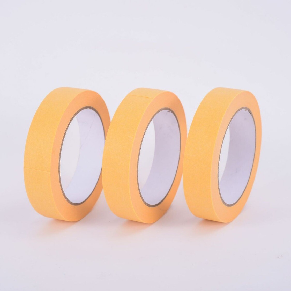 Masked paper tape for spray painting and masking. Hand torn masking tape can be used for writing without leaving residue. Painted decorative masking paper