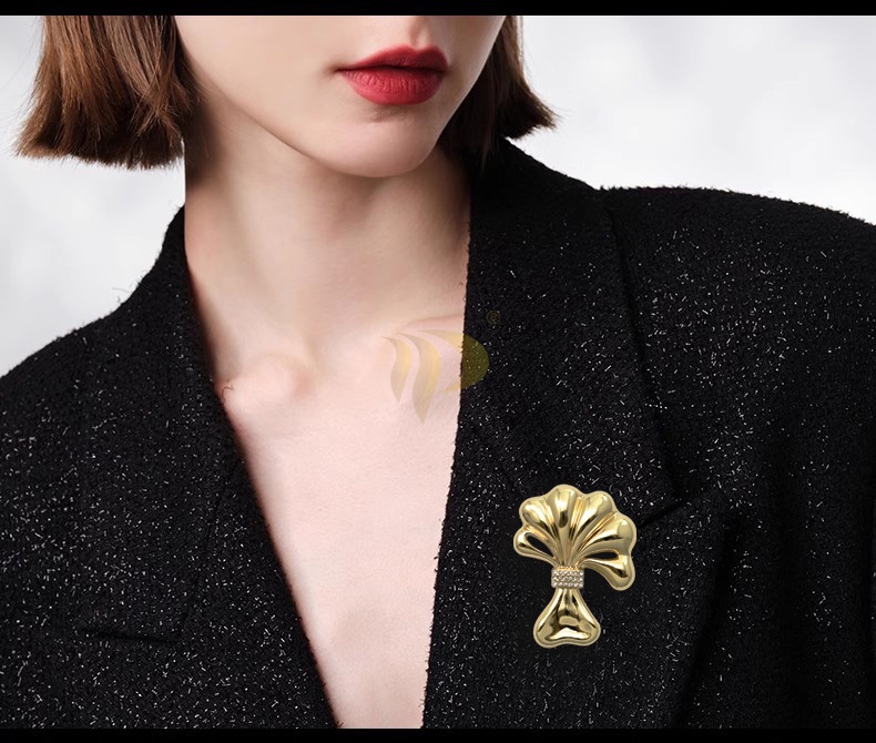 Broche decorativa com fecho