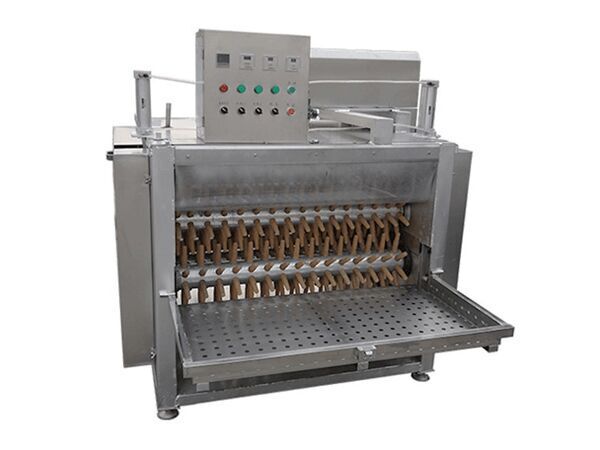 Machine à plumer commune