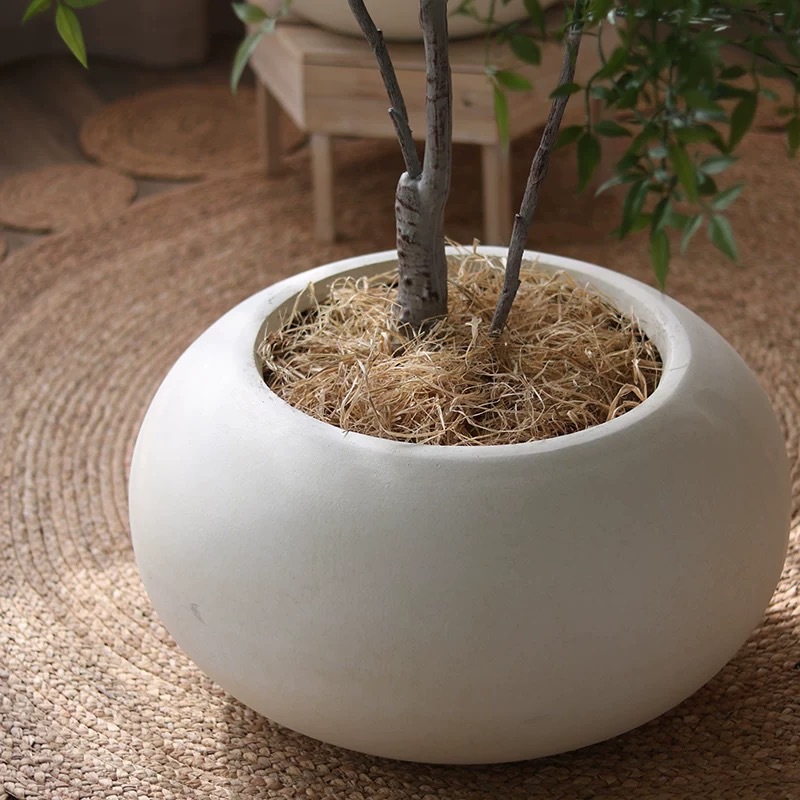 Flat spherical flower pot