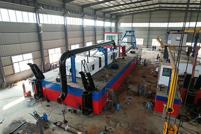 The blue color sand dredger has a designed hull length of 19 meters 1
