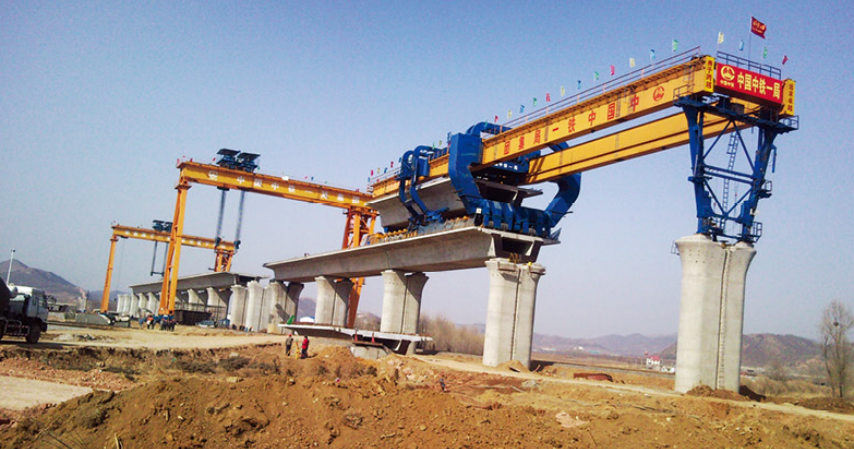 factory produces portal cranes for port use, specifically for unloading heavy loads10