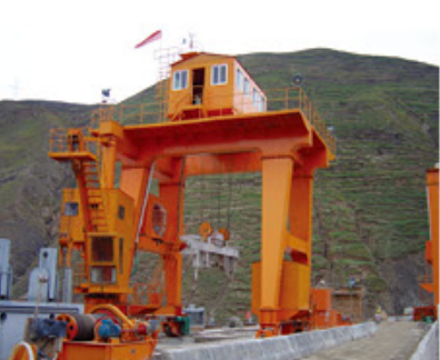 The factory produces portal cranes for port use, specifically for unloading heavy loads3