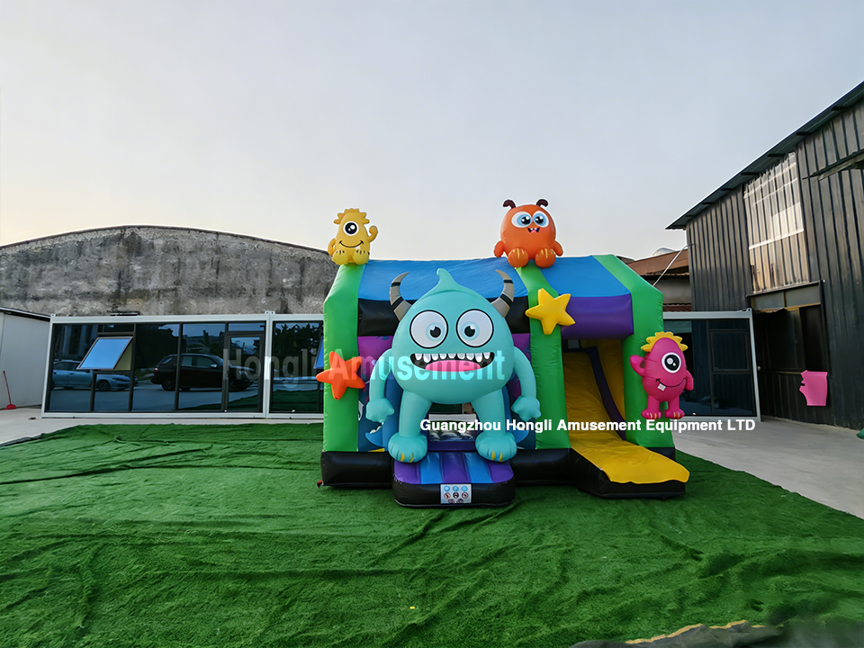 inflatable monster castle with slide