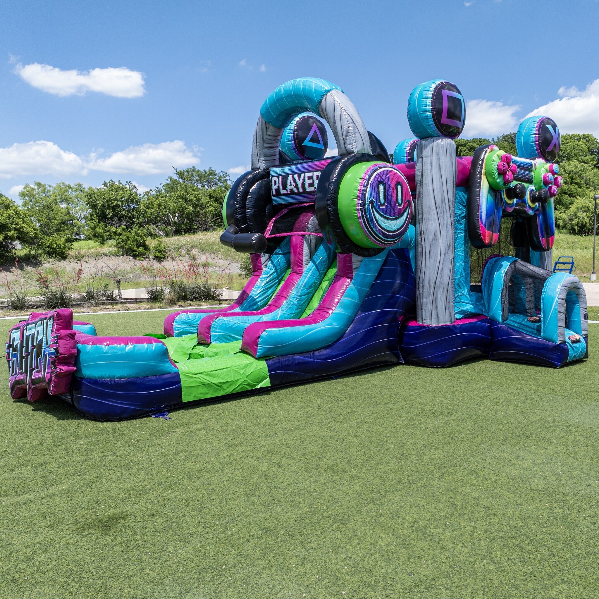 Inflatable bouncer with water slide