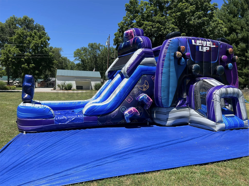 Inflatable bouncer with water slide