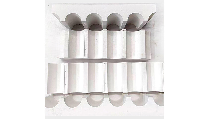 Bloques de algodón aislante en la abertura del transportador de rodillos del cuerpo del horno (superior e inferior)