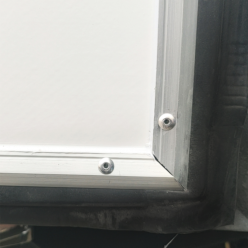 Compression trim strips for refrigerated trucks