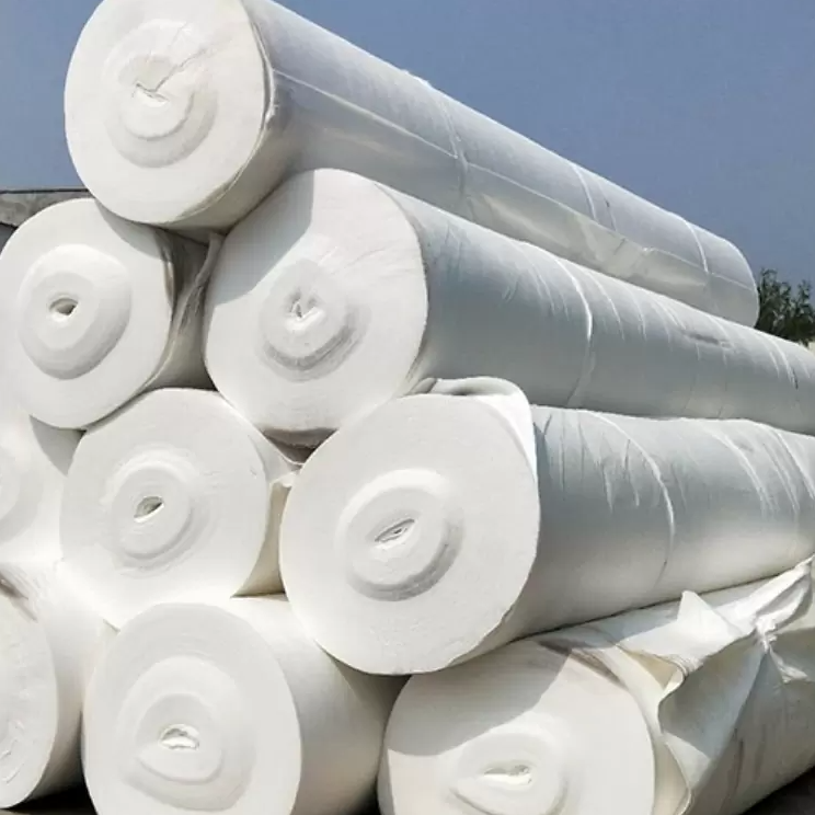 Short fiber needle punched nonwoven geotextile