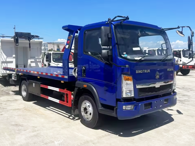 Howo 4x2 wrecker truck 8-15 tons with crane and winch rescue trailer