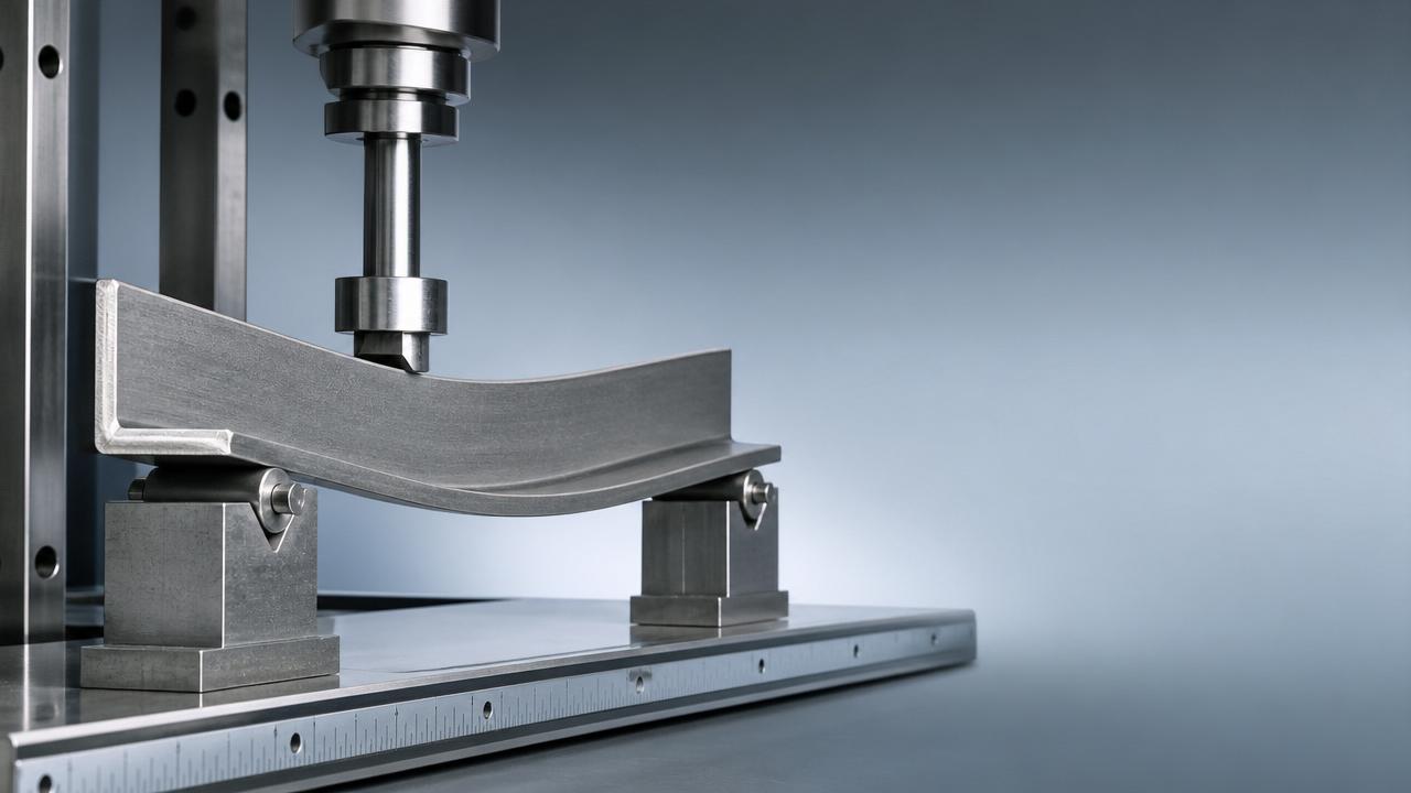 When does l shaped angle iron bend under load?