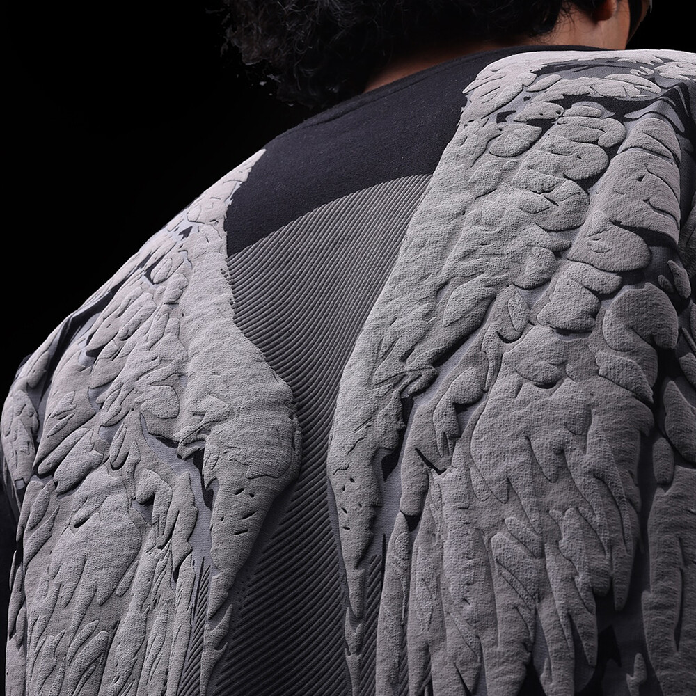 Custom-made white Angel Wings short-sleeved streetwear T-shirt made of high-quality cotton-polyester blend fabric in a regular style