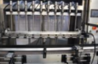 MÁQUINA AUTOMÁTICA DE ENCHIMENTO DE LÍQUIDOS PACKINDMALHINEE