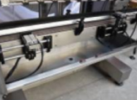 MÁQUINA AUTOMÁTICA DE ENCHIMENTO DE LÍQUIDOS PACKINDMALHINEE