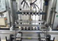 MÁQUINA AUTOMÁTICA DE ENCHIMENTO DE LÍQUIDOS PACKINDMALHINEE
