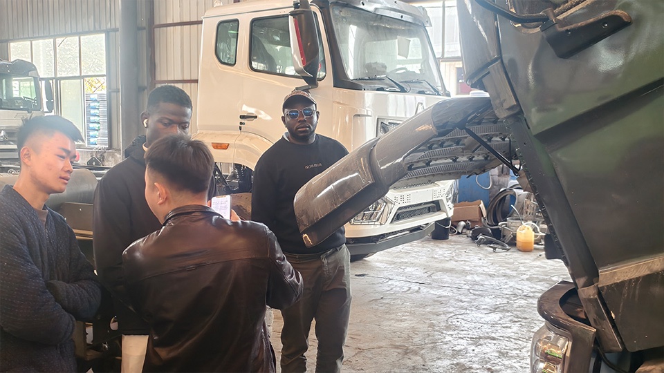 Burundian customers inspect Hohan heavy-duty tractor trucks