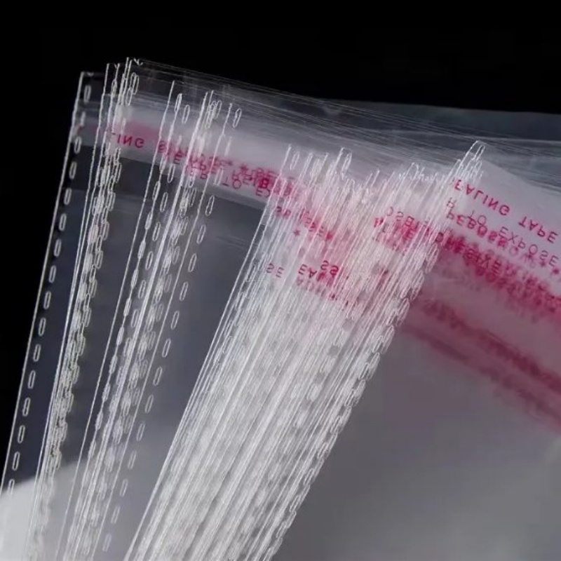Self adhesive bag