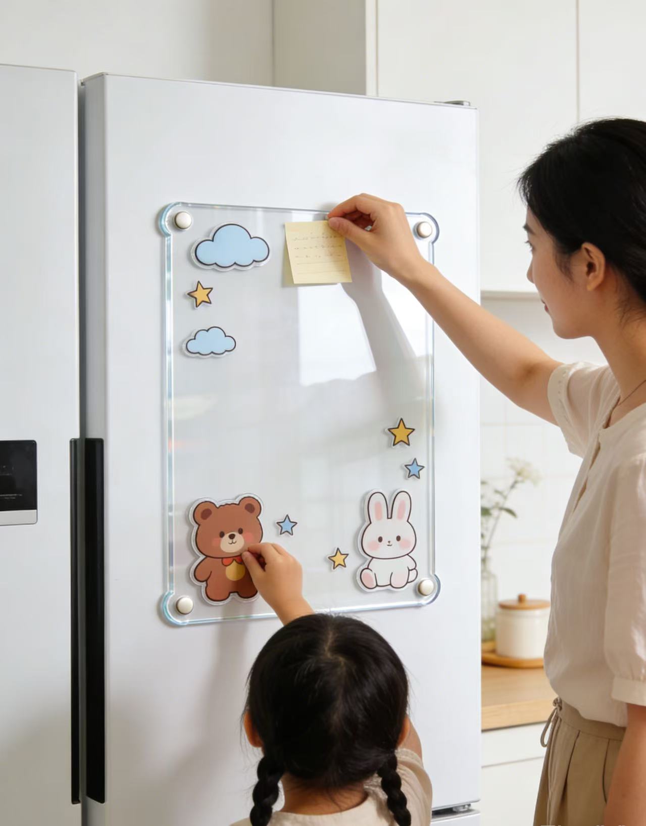 The refrigerator message board is filled with the little warmth of the whole family