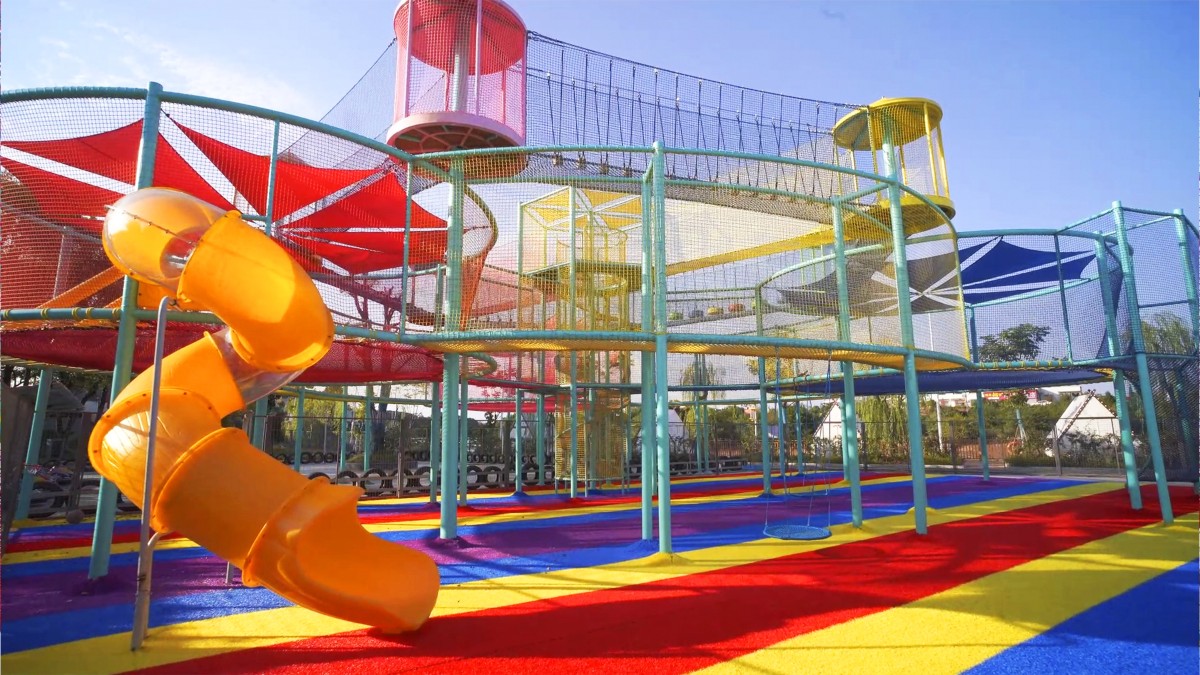 commercial-aerial-adventure-playground-spiral-slide-ropecube commercial-aerial-adventure-playground-spiral-slide-ropecube
