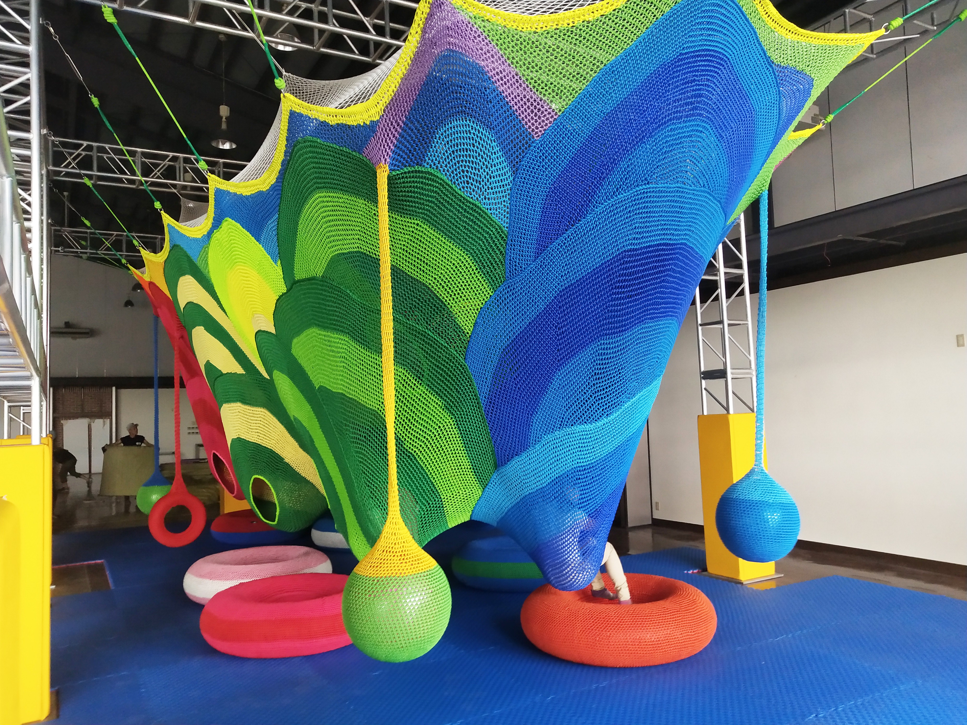 Rainbow Crochet Playground: Custom Hand-Woven Suspended Play Nets