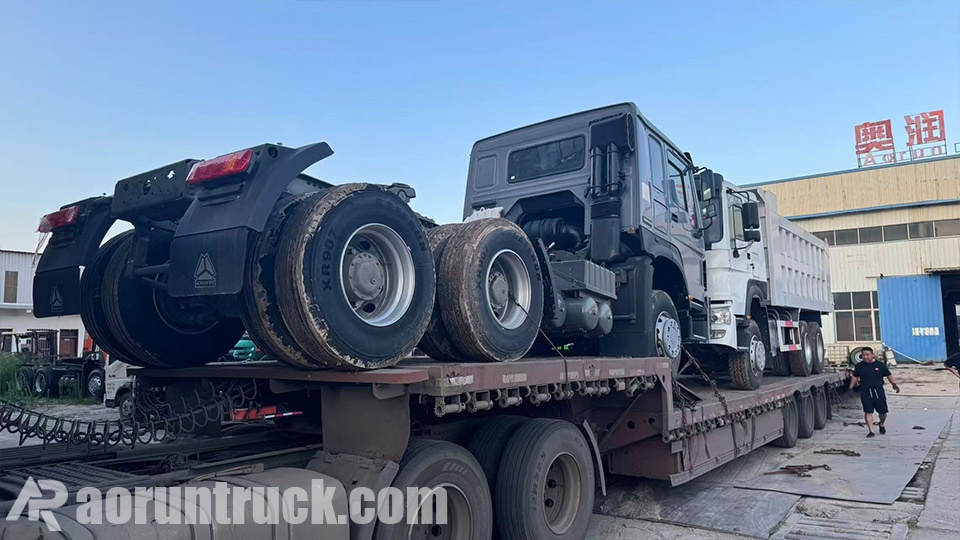 1 camion-benne Sinotruk HOWO et 1 tracteur routier expédiés via le port de Port-Soudan