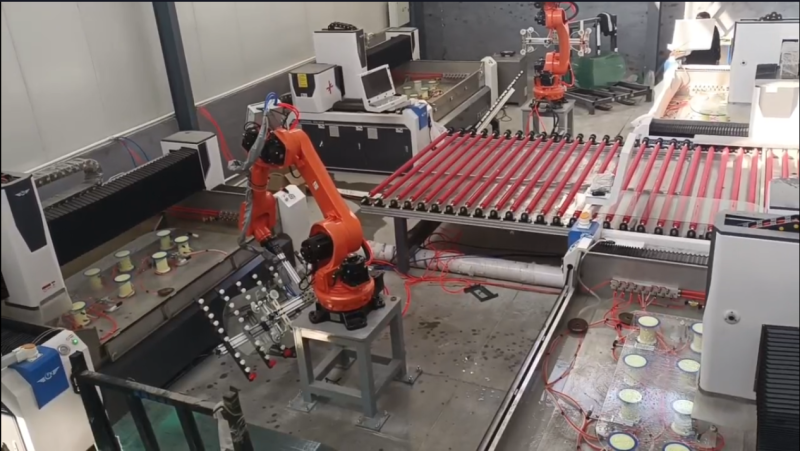 Glass processing center with robotic arm