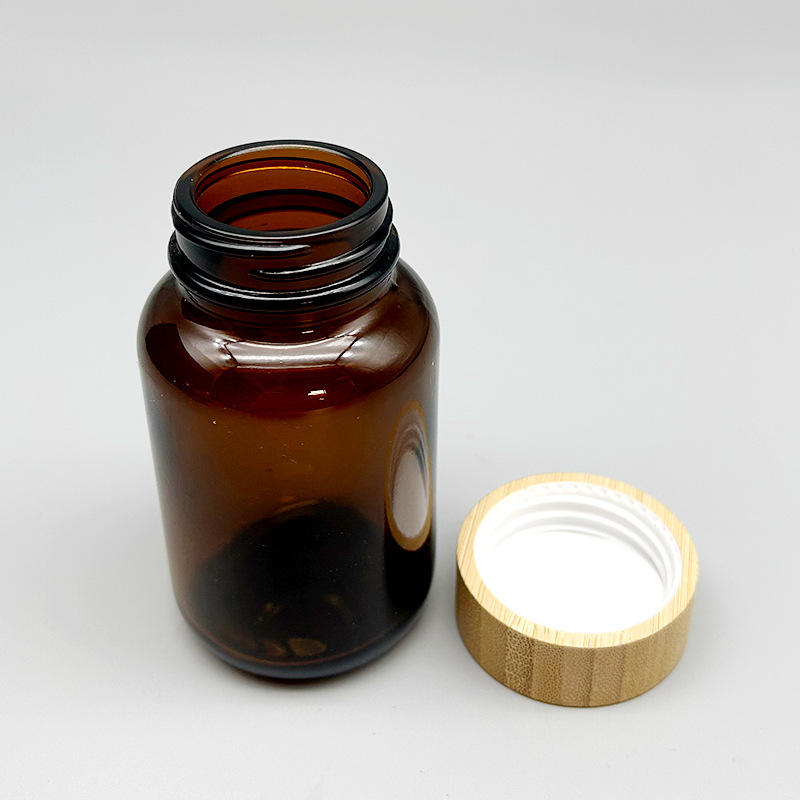 Hot Sale Amber Glass Jar Bamboo Lid 60-200ml Cosmetic Packaging Bottle Hot Sale Amber Glass Jar Bamboo Lid 60-200ml Cosmetic Packaging Bottle