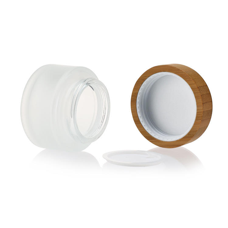 Wholesale Clear Frosted Glass Cream Jar 50g with Bamboo Cap for Eye Cream and Skin Care Packaging Wholesale Clear Frosted Glass Cream Jar 50g with Bamboo Cap for Eye Cream and Skin Care Packaging