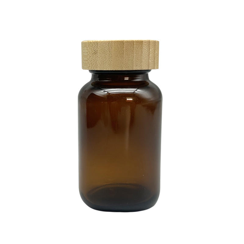 Wholesale Amber Glass Medicine Bottle with Bamboo Lid 60ml 75ml 100ml 200ml Supplement Jar Custom Labels Logos Cosmetic jar Wholesale Amber Glass Medicine Bottle with Bamboo Lid 60ml 75ml 100ml 200ml Supplement Jar Custom Labels Logos Cosmetic jar