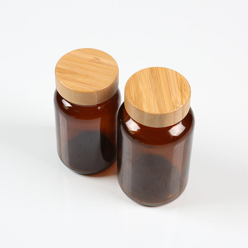 Wholesale Amber Glass Medicine Bottle with Bamboo Lid 60ml 75ml 100ml 200ml Supplement Jar Custom Labels Logos Cosmetic jar Wholesale Amber Glass Medicine Bottle with Bamboo Lid 60ml 75ml 100ml 200ml Supplement Jar Custom Labels Logos Cosmetic jar