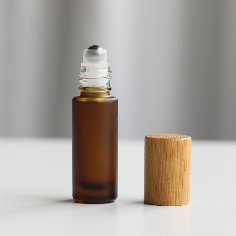 5ml 10ml 15ml Amber Frosted Clear Glass Roller Bottle with Bamboo Lid for Essential Oil Perfume Cosmetic Packaging 5ml 10ml 15ml Amber Frosted Clear Glass Roller Bottle with Bamboo Lid for Essential Oil Perfume Cosmetic Packaging