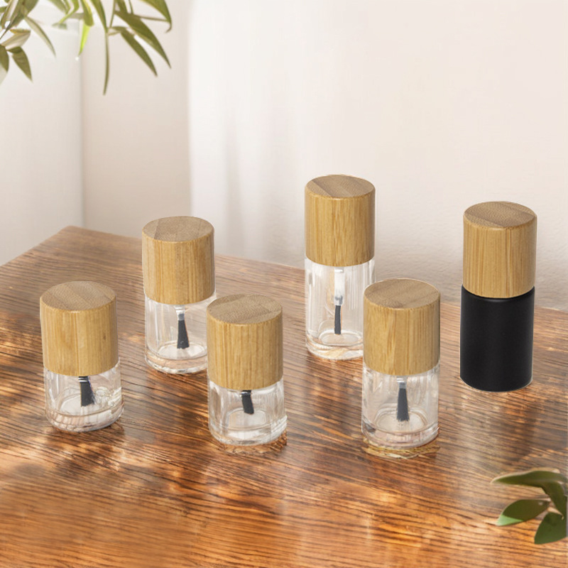 Eco Friendly Clear Glass Nail Oil Polish Bottle Bamboo Lid Screw Cap 5ml 10ml 15ml Refillable Cosmetic Packaging Container Eco Friendly Clear Glass Nail Oil Polish Bottle Bamboo Lid Screw Cap 5ml 10ml 15ml Refillable Cosmetic Packaging Container
