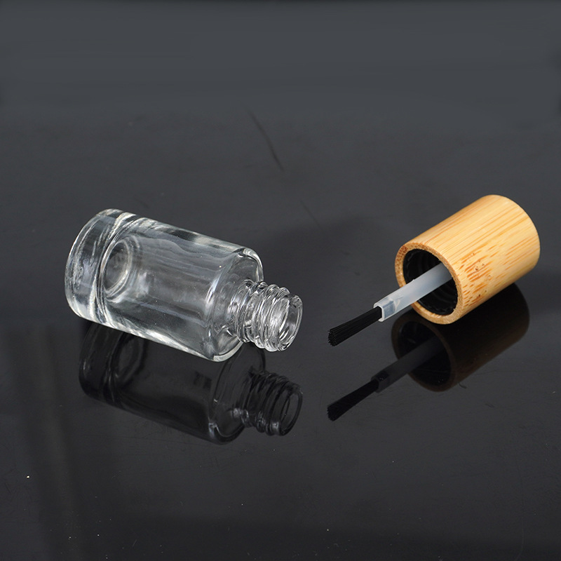 Eco Friendly Clear Glass Nail Oil Polish Bottle Bamboo Lid Screw Cap 5ml 10ml 15ml Refillable Cosmetic Packaging Container Eco Friendly Clear Glass Nail Oil Polish Bottle Bamboo Lid Screw Cap 5ml 10ml 15ml Refillable Cosmetic Packaging Container