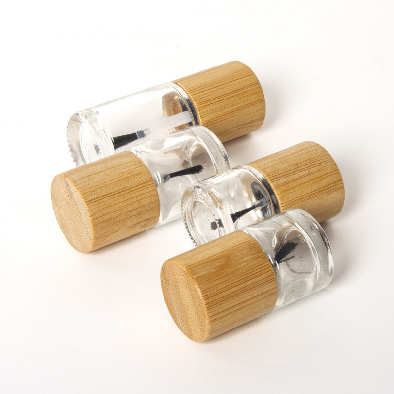Eco Friendly Clear Glass Nail Oil Polish Bottle Bamboo Lid Screw Cap 5ml 10ml 15ml Refillable Cosmetic Packaging Container Eco Friendly Clear Glass Nail Oil Polish Bottle Bamboo Lid Screw Cap 5ml 10ml 15ml Refillable Cosmetic Packaging Container