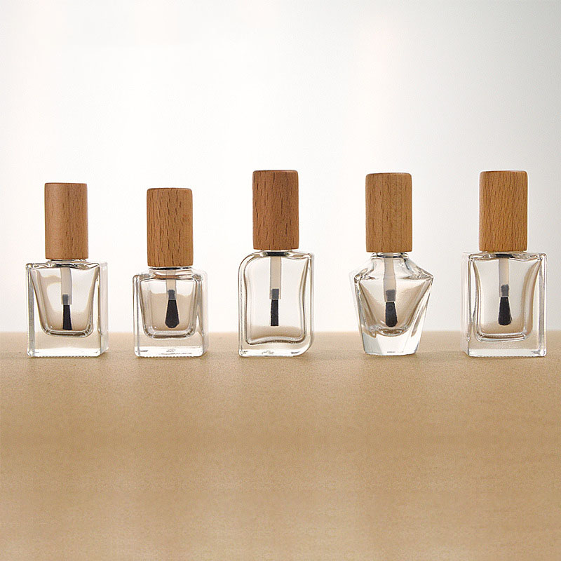 Eco Friendly Clear Glass Nail Oil Polish Bottle Bamboo Lid Screw Cap 5ml 10ml 15ml Refillable Cosmetic Packaging Container Eco Friendly Clear Glass Nail Oil Polish Bottle Bamboo Lid Screw Cap 5ml 10ml 15ml Refillable Cosmetic Packaging Container