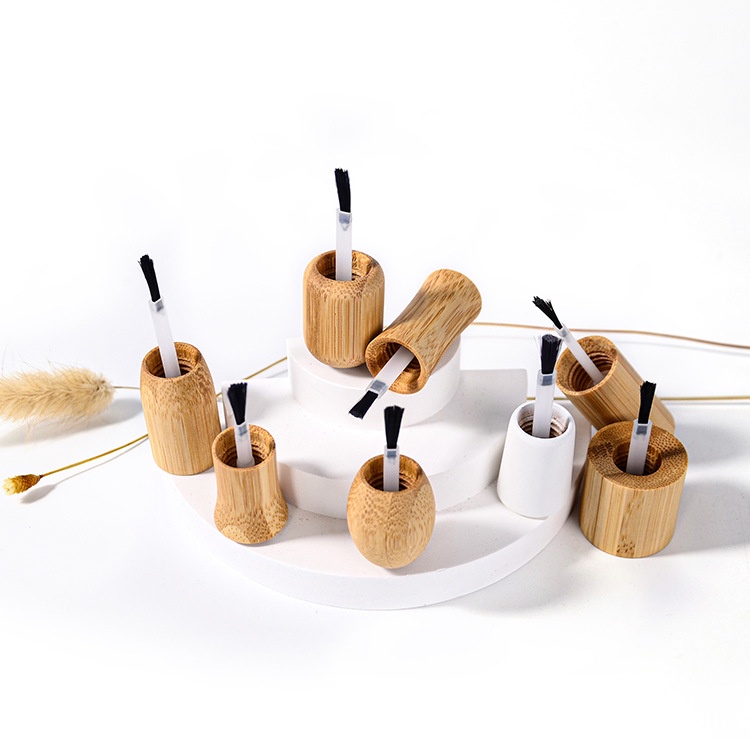 Custom High Quality Empty Reusable 10ml Cylinder Glass Gel Nail Polish Bottles with Bamboo Cap Custom High Quality Empty Reusable 10ml Cylinder Glass Gel Nail Polish Bottles with Bamboo Cap