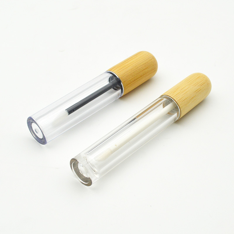 Wholesale 7ml 10ml Empty clear Lip Gloss Tube Glass Bottle Cylindrical Bamboo Lid for Personal Care Packaging Wholesale 7ml 10ml Empty clear Lip Gloss Tube Glass Bottle Cylindrical Bamboo Lid for Personal Care Packaging