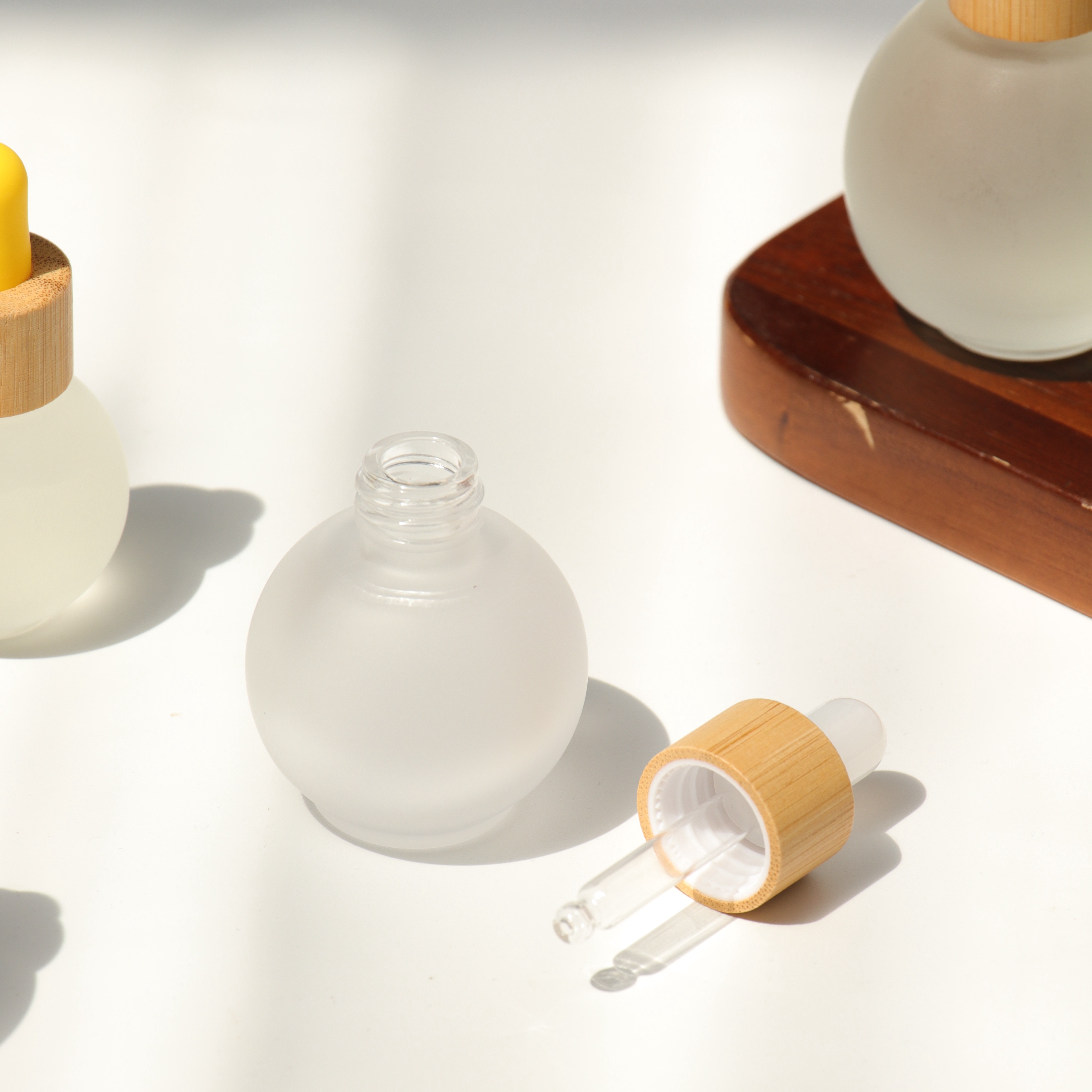 Luxury Round Ball Shape Frosted Glass Dropper Bottle 20ml 30ml 50ml Clear Bamboo Cosmetic Bottle for Essential Oil Serum