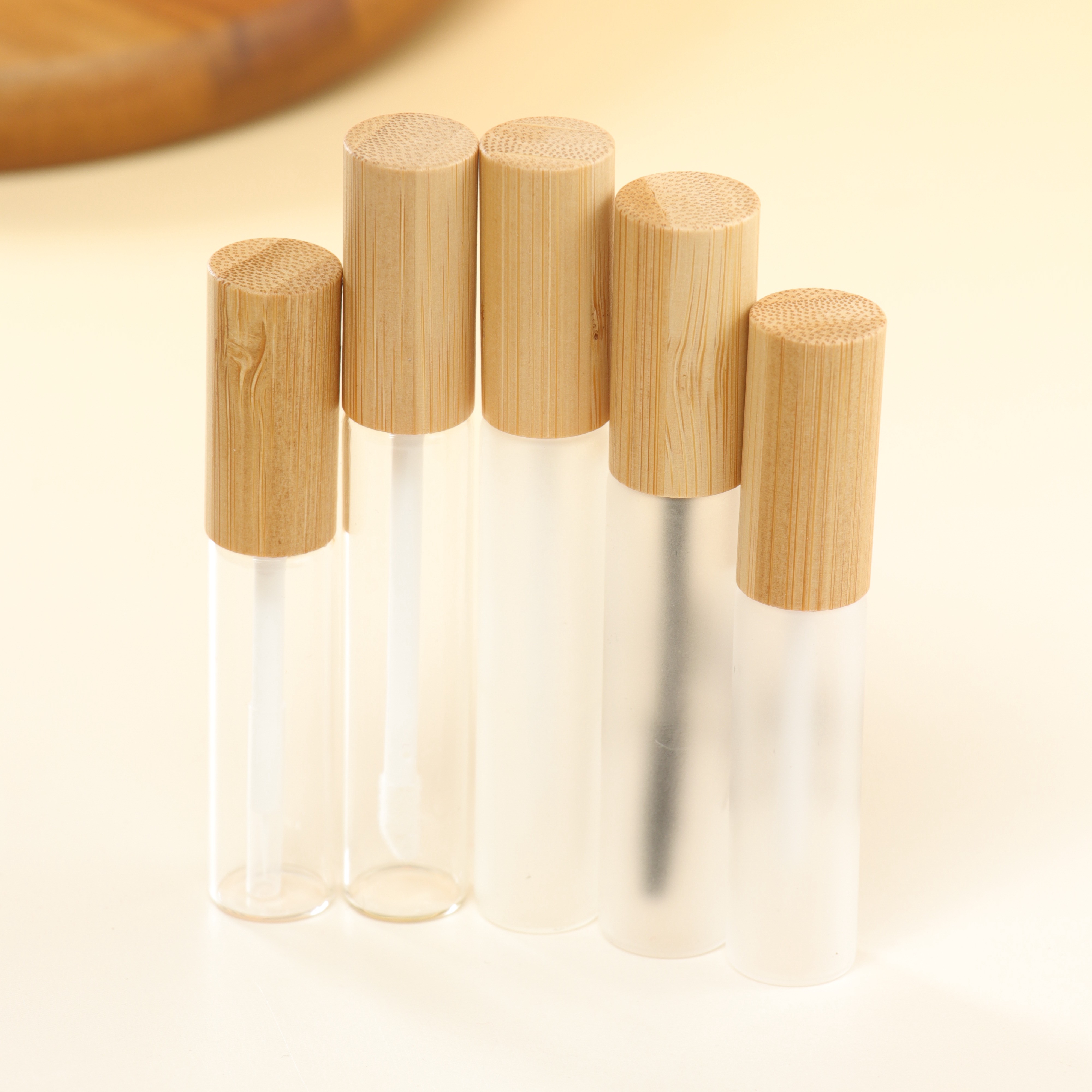 Eco Friendly Wholesale Empty Glass Eyeliner Tube with Bamboo Cap Custom Logo Cosmetic Packaging
