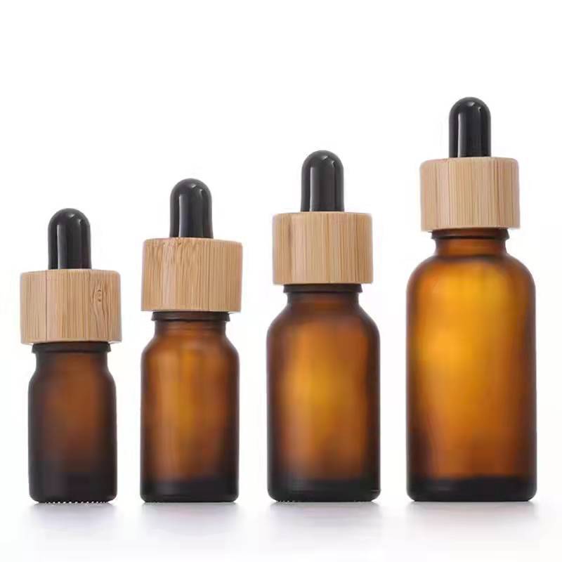 High Quality 30ml Frosted Glass Dropper Bottles with Natural Beech Wood Bamboo Lid for Essential Oil Serum Cosmetic Packaging High Quality 30ml Frosted Glass Dropper Bottles with Natural Beech Wood Bamboo Lid for Essential Oil Serum Cosmetic Packaging
